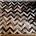DR01. Herringbone pattern cowhide rug.  Measures approx. 8' x 10' 